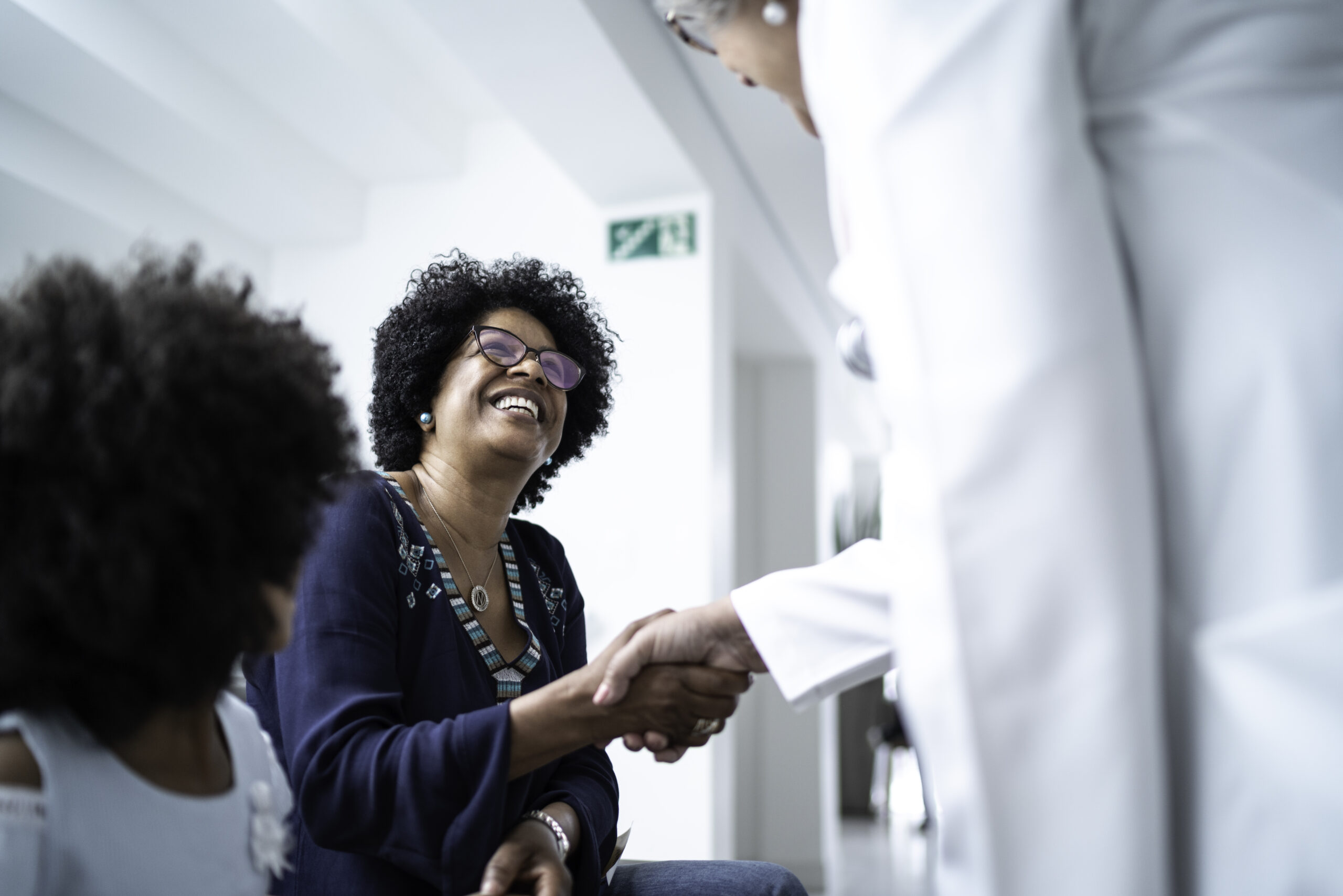 patient shaking hands with doctor