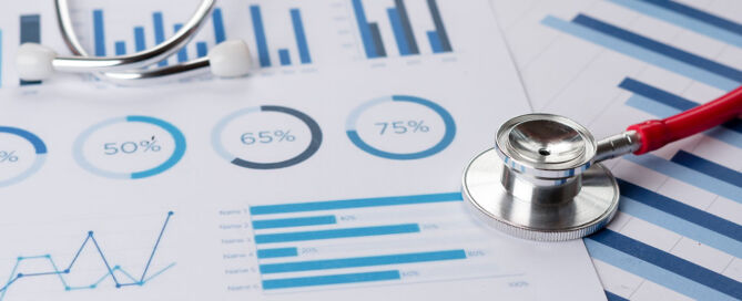 stethoscope with graphs and charts